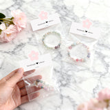 joycraft Jewelry Packaging for Small Business – 100Pcs White Bracelet Display Cards with Clear Bags, Small Handmade Jewelry Display Set for Bracelets, Key Chains, Earring, DIY Craft (Pink Flower)